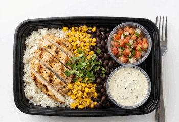 Chicken Bowl w/ jasmine rice, corn, black beans, pico de gallo & A SIDE of CILANTRO CREME, cilantro