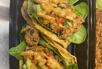 Black Bean Tacos w/vegan beef, spinach, beans, side of pico de gallo,cilantro creme, vegan cheese