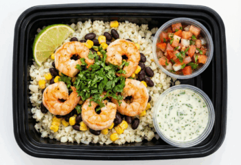 CAULIFLOWER RICE BURRITO BOWL-SHRIMP / black beans, corn, pico de gallo, cilantro cream sauce,topped w/ cilantro, lime wedge