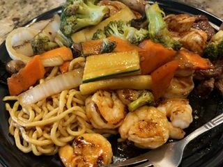 Shrimp Hibachi w/ noodles, veggie medley, green onion, lemon sriracha sauce, sesame seeds