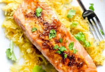 Lemon Salmon scampi over spaghetti squash w/ garlic butter, cherry tomatoes, veg seasoning and spinach