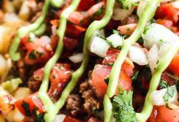 Loaded Vegan Beef Potato Bowl w/ red potatoes, peppers and onion,  pico de gallo, corn, beans, cilantro creme