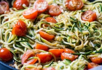 Zucchini Noodles w/ grilled chicken, cherry tomatoes topped with garlic herb butter