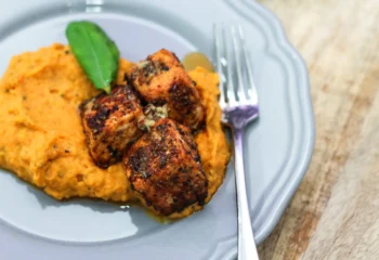 Salmon Bites over sweet potato mash & grilled zucchini