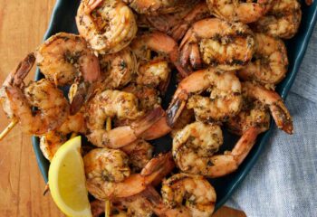 Grilled Shrimp over garlic mash & green beans, lemon wedge