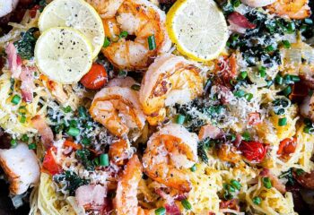 Shrimp Scampi over spaghetti squash w/ lemon, garlic butter, cherry tomatoes, veg seasoning and spinach