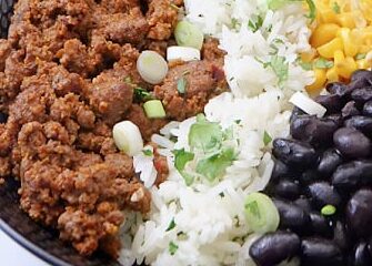 CAULIFLOWER RICE BURRITO BOWL-TURKEY / black beans, corn, pico de gallo, cilantro cream sauce,topped w/ cilantro, lime wedge