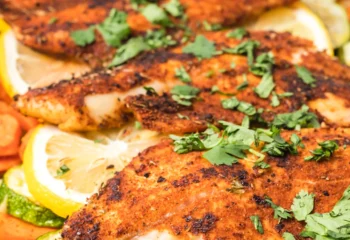 Blackened Lemon Tilapia over mash & spinach w/ cherry tomatoes, parsley (2 pcs)