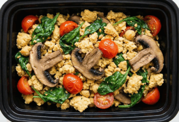 Chickpea eggs scramble w/ spinach, cherry tomatoes, and portobello mushrooms