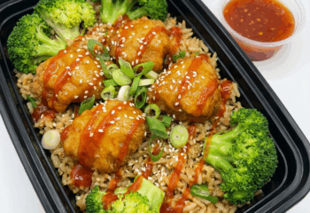 Vegan Fried Rice w/ fried lion's mane orange chicken,broccoli, topped with green onion, thai chili and a side of thai chili, white & black sesame seeds