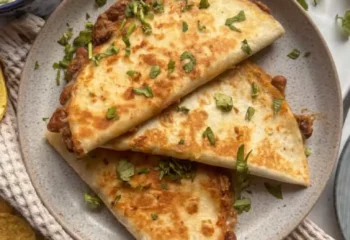 Veggie Tacos w/ vegan cheese, peppers onion, portobello (2) w/ roasted sweet potatoes, pico de gallo and cilantro cream sauce, lime Veggie Tacos w/ vegan cheese, peppers onion, portobello (2) w/ roasted sweet potatoes, pico de gallo and cilantro cream sauce, lime