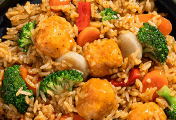 Vegan Fried Rice w/ fried lion's mane orange chicken,broccoli, topped with green onion, thai chili and a side of thai chili, white & black sesame seeds Vegan Fried Rice w/ fried lion's mane orange chicken,broccoli, topped with green onion, thai chili and a side of thai chili, white & black sesame seeds