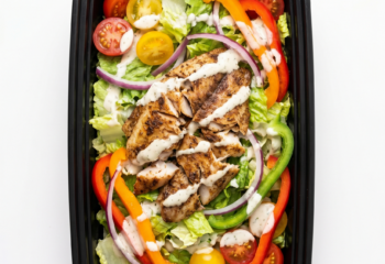 Jerk Tilapia Salad w/ romaine, cherry tomatoes, mixed peppers & onion, ranch (2 pcs)